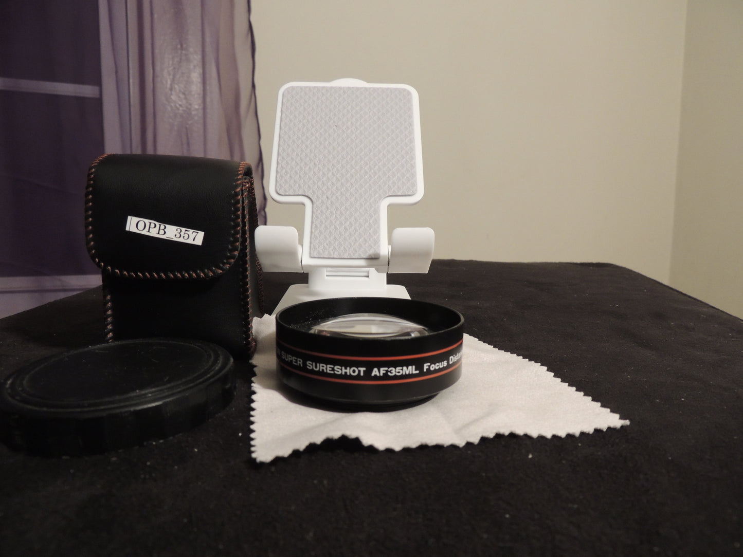 Canon Sureshot AF-35MM Wide Angle Telephoto Lens, 4.7 ft, with original safety leather case.