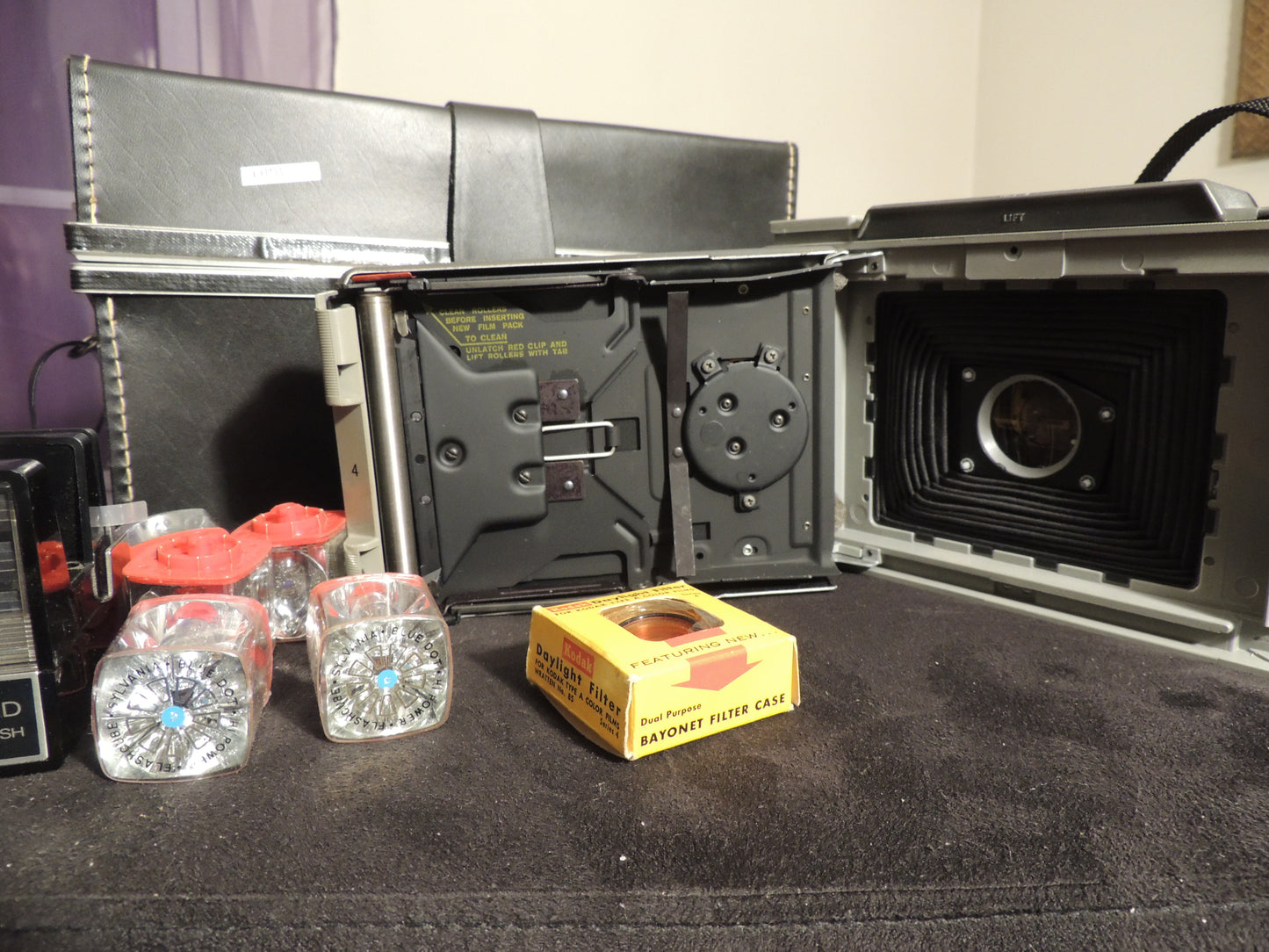 polaroid 440 with flash gun, flash cubes, filter case and original case