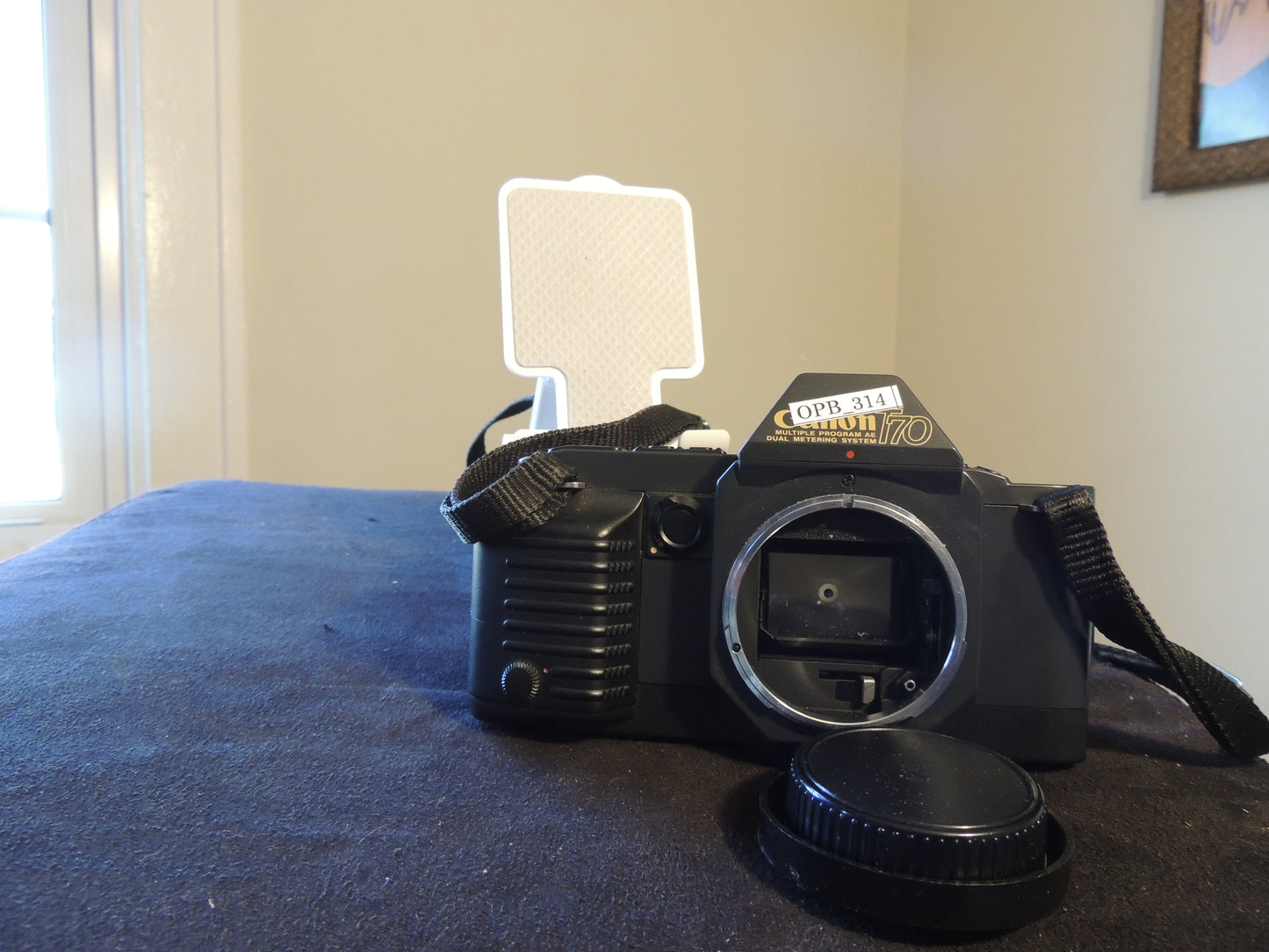Canon T70, Camera only with original strap.