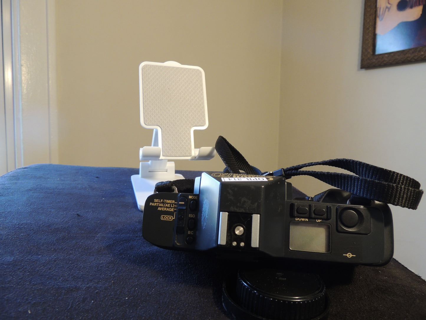 Canon T70, Camera only with original strap.