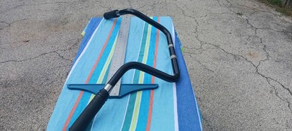 Harley Davidson replacement handlebar. Fits different models. 31 inches wide, 14 inches tall.