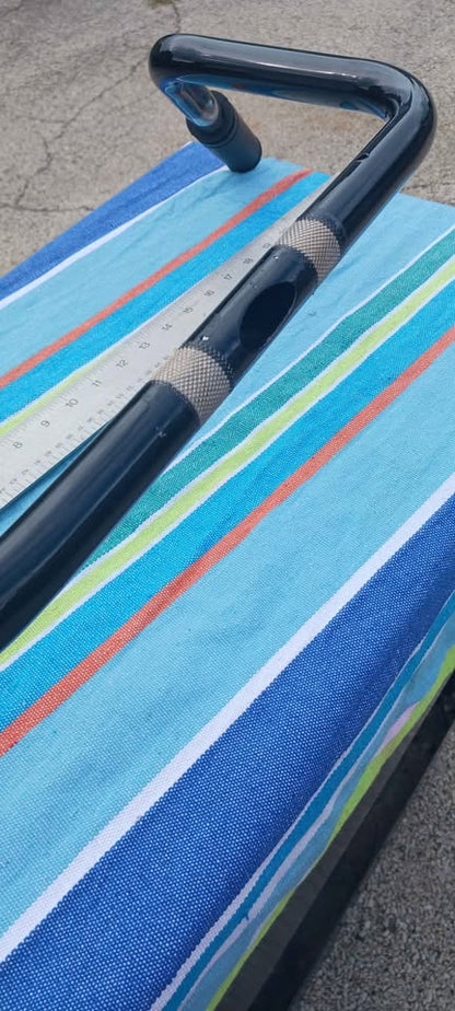 Harley Davidson replacement handlebar. Fits different models. 31 inches wide, 14 inches tall.