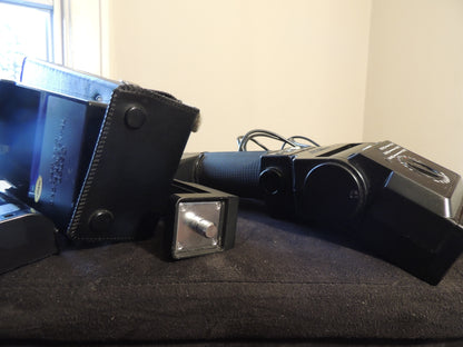 Canon Speedlite 533G flash package with battery and charger