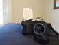 Canon T70, Camera only with original strap.