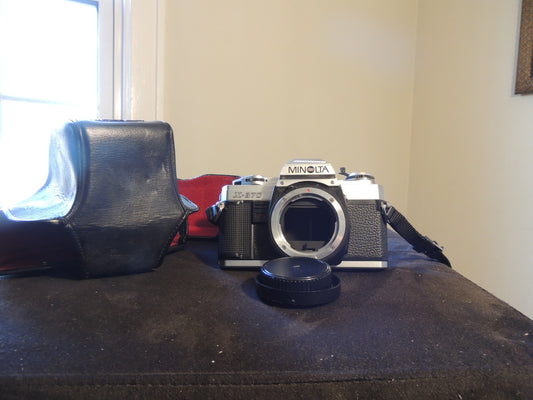 Minolta X-370 35mm Film SLR Camera, with original strap and leather case