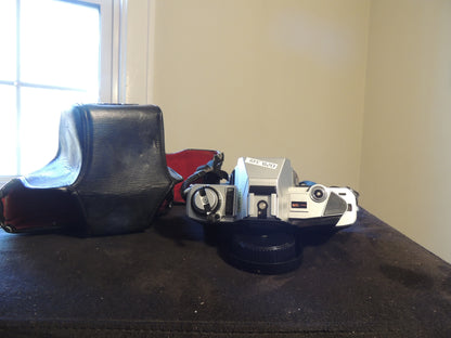 Minolta X-370 35mm Film SLR Camera, with original strap and leather case